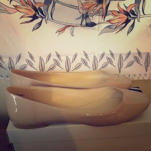 Nine West Nude Patent Leather Flats.
